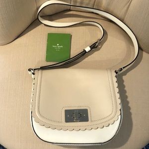 💯% authentic beige and white kate spade bag